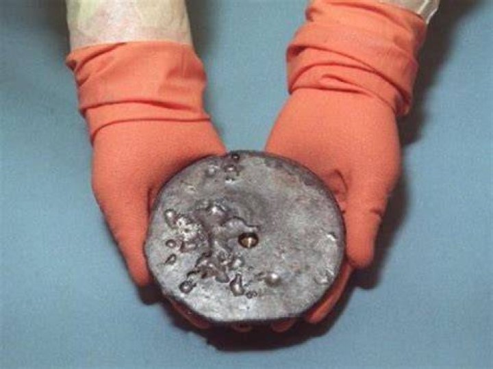 Can you touch uranium?