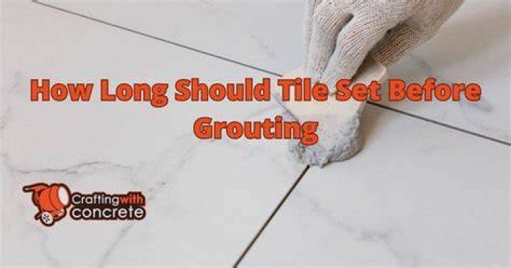 How long should tile sit before grouting?